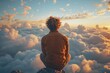 An individual sits atop a cliff, lost in contemplation, gazing at a captivating, cloud-filled sky at sunset