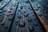Fototapeta  - Macro shot capturing the intricate details of water droplets on a textured wooden surface, showcasing contrast and depth