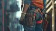 Close-up of Maintenance worker with bag and tools kit wearing on waist