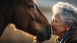 Elderly woman and horse sharing gentle nose-to-nose touch. Warm lighting with soft focus. Concept of animal therapy, companionship, elderly care, leisure and nature bonding.