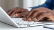© Viktoria - Workspace with hands typing on keyboard, notebook, and pen, copy space available