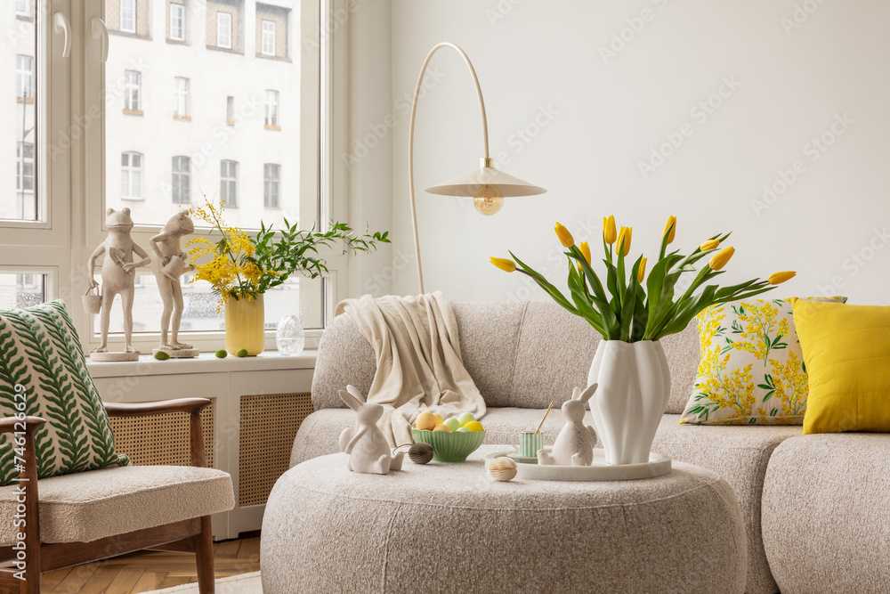Interior design of spring living room with design sofa, furniture, vase ...