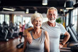 Active Senior Couple in Gym Smiling. A senior couple smiles brightly in a gym, showcasing active lifestyles in later years. Their joy and fitness inspire healthy living at any age.