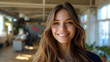 © Jeff - Smiling and confident female office associate - close-up shot - open office - profile shot - open office - bright space