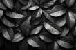 Black and white leaves captured in a play of light and shadow.