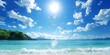 Bright tropical beach panorama with the sun shining over clear blue waters and a flock of birds in the sunny sky