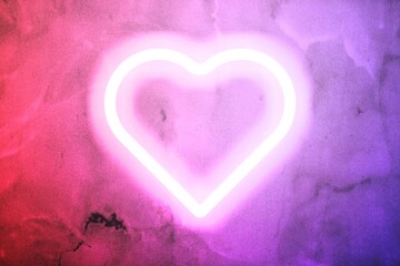 Wall Mural - Neon heart glow on the wall background