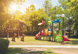 Fototapeta Łazienka - Colorful playground on yard in the park.