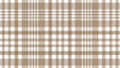 Brown and white plaid fabric texture as a background	