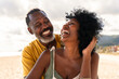 © oneinchpunch - Beautiful mature black couple of lovers dating at the seaside - Married african middle-aged couple bonding and having fun outdoors, concepts about relationship, lifestyle and quality of life
