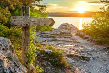 Poster - Wooden signpost on the background of the sea and the sun.