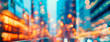 Abstract night lights, view of a modern futuristic cityscape. Defocused image of an urban street between tall buildings, towers, skyscrapers with glowing windows. Wide scale image.