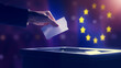 2024 European Union elections concept with European flag on background. A hand inserts the ballot into the ballot box. 
