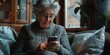 elderly woman looking at smartphone Generative AI