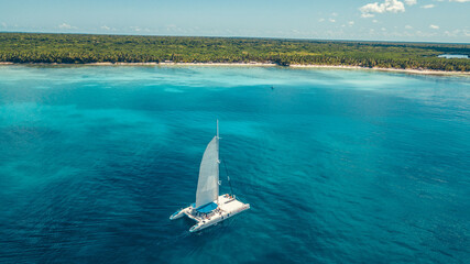 Boat in the caribbean sea with tropical water in dominican republic on paradise 