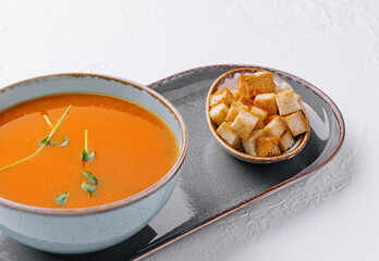 Wall Mural - plate of pumpkin cream soup with croutons