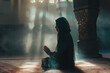 Arabian woman praying in mosque. Cinematic effect