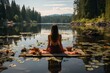 A woman meditates during yoga classes by the lake in summer, sitting on a wooden pier