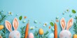 Creative Easter setup with carrots as bunny ears and handmade textile eggs on a serene pastel blue background.