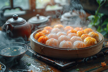 Traditional Chinese Dumplings In A Bamboo Steamer With Steam And A Pot Of Chinese Tea On The Table