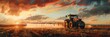 Farming Tractor Spraying Under Stormy Sunset Sky