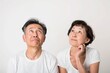 © Maki_Japan - 考えている日本人の初老の夫婦（白背景・老後・介護・健康・年金・将来）