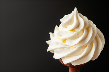 Wall Mural - White texture of Vanilla ice cream with whipped cream on a stick on a black background. Detailed pure creamy background