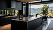 Modern black kitchen with island bench, black marble top, minimalist design, wooden floor, and large windows providing a scenic view of the lake and mountains in the background.