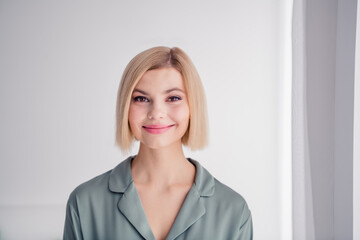 Sticker - Portrait of satisfied blonde bob hair lady in gray pajama stay home glad to see you enjoying comfort isolated over light white interior