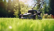 Lawn mower mowing fresh green grass