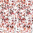 An abstract pattern featuring dots and floral shapes in shades of orangeade and radiant red, reminiscent of desert blooms.
