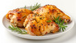 Baked chicken with golden crust on a plate with rosemary isolated on white background. generative ai 