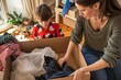 Woman and child sorting clothes and packing into cardboard box. Donations for charity, help low income families, declutter home, sell online, moving moving into new home, recycling, Generative AI