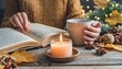 cozy autumn or winter composition with aromatic candle wool sweater aromatherapy home atmosphere of cosiness and relax woman reading a book wooden background close up