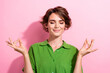 © deagreez - Photo portrait of attractive young woman hands gesture om meditate dressed stylish green clothes isolated on pink color background