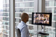 © ReeldealHD images - Businessman Using Video Conferencing technology for video call with colleagues working remotely