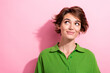 © deagreez - Photo of dreamy excited lady wear green shirt looking empty space isolated pink color background