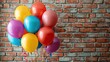 © chaynam - Bunch of bright balloons and space for text against brick wall