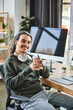 © LIGHTFIELD STUDIOS - Relaxed young man with stylus pen and coffee smiling at a startup post-production workspace