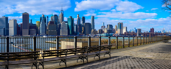 Panoramic New York City Lower Manhattan Skyline and skyscrapers over the East River, the view from Brooklyn Heights Promenade in New York, USA