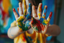 Close Up Of Little Child Showing Paint On His Hands After Painting, Education Concept