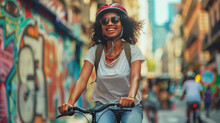 A young woman riding a bicycle in the city.