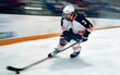Ice hockey game in action, player striking a puck with rapid movement, frozen motion blur capturing the speed
