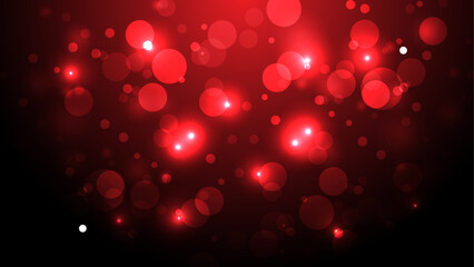 red bokeh in the shape of hearts on red background. Celebrating Valentine's day.