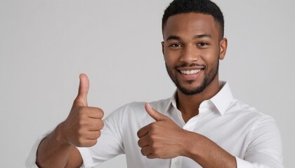 Wall Mural - A man in a white polo shirt makes a positive thumbs up gesture. His confident smile indicates approval.