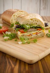 Wall Mural - sandwich with sausage and herbs