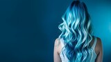 model woman from behind with beautiful long wavy hair, dyed hair