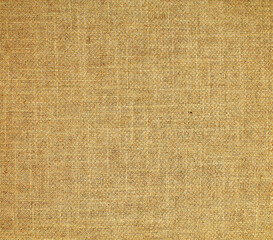 Close-up detail of fabric natural color Hemp material pattern design wallpaper. can be used as background or for graphic design. Natural linen material textile canvas Fabric texture background
