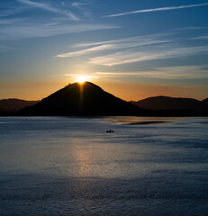 Wall Mural - Sunset from the fishing village of Santoña in the Marismas de Santoña, Victoria y Joyel Natural Park. Cantabrian Sea. Santoña, Cantabria, Spain, Europe