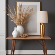 This Modern Interior Design Includes A Hardwood Table Adorned With A Variety Of Ornamental Pieces.A White Porcelain Vase With Dried Spikelets Within Is One Of These Things, Along With A Golden Picture